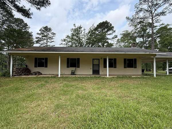 6 Acres of Land with Home for Sale in Saline Township, Arkansas