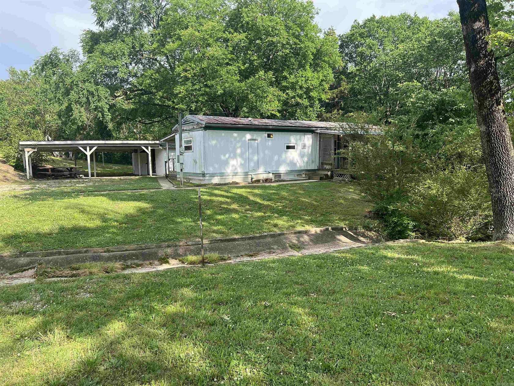 1.16 Acres of Land with Home for Sale in Norman, Arkansas