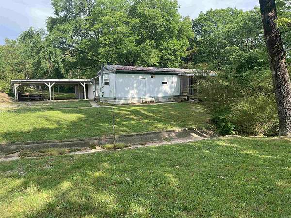 1.16 Acres of Land with Home for Sale in Norman, Arkansas