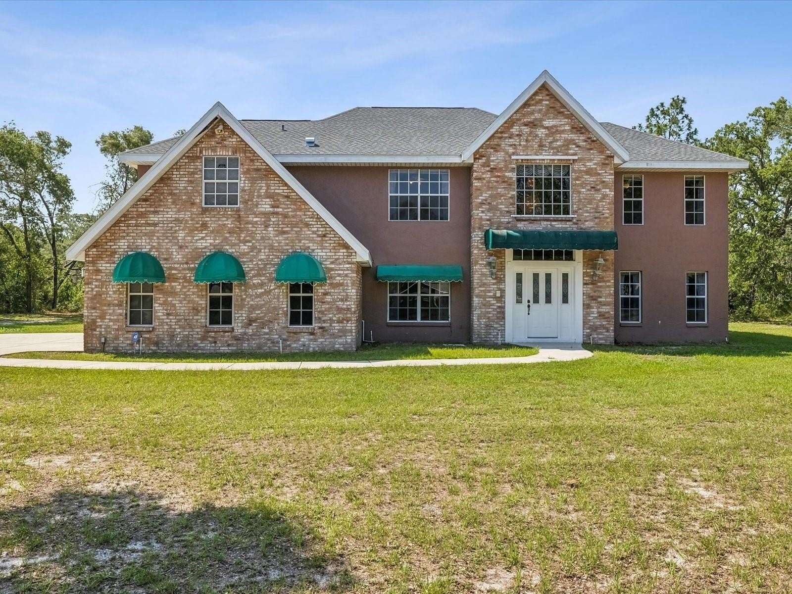 2.35 Acres of Land with Home for Sale in Spring Hill, Florida