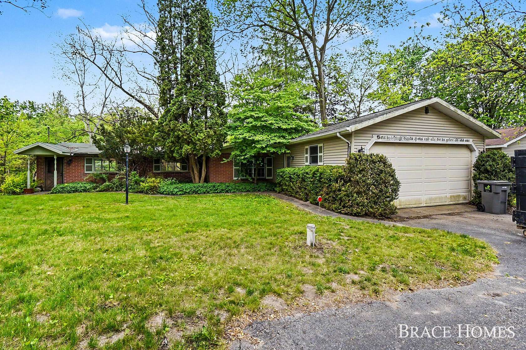 1.5 Acres of Land with Home for Sale in Alto, Michigan