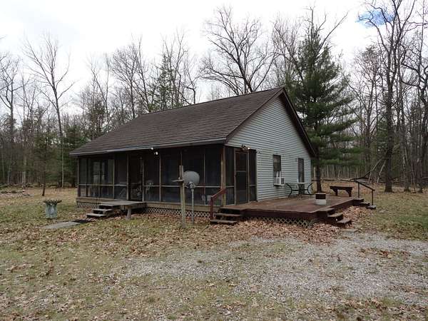 25 Acres of Recreational Land with Home for Sale in Manistee, Michigan