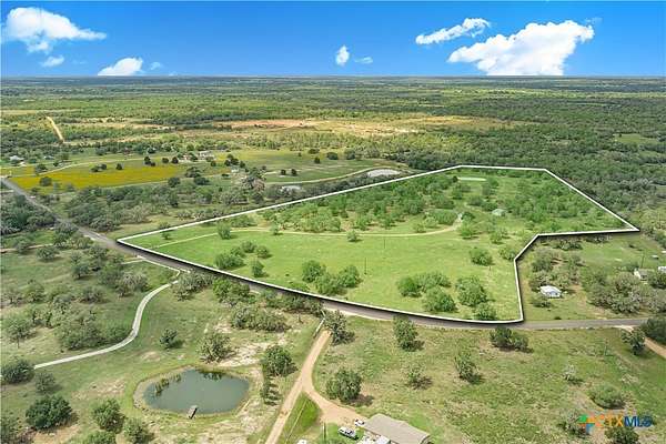 23.3 Acres of Agricultural Land with Home for Sale in Cuero, Texas