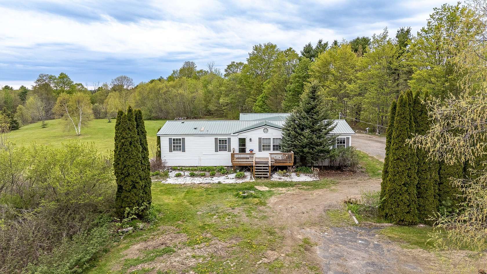12.2 Acres of Land with Home for Sale in Dover-Foxcroft, Maine