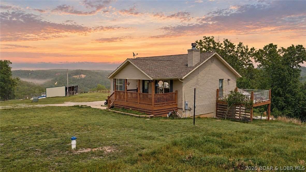 16.2 Acres of Land with Home for Sale in Camdenton, Missouri