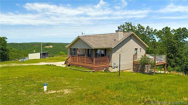 16.2 Acres of Land with Home for Sale in Camdenton, Missouri