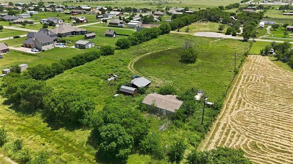 2.89 Acres of Land with Home for Sale in Justin, Texas