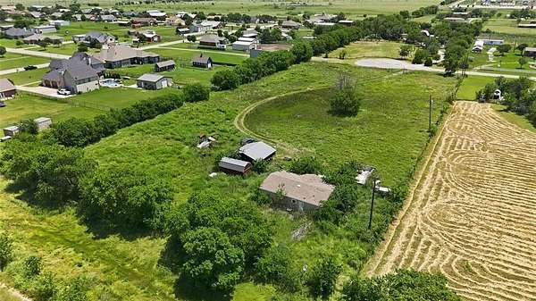 2.89 Acres of Land with Home for Sale in Justin, Texas