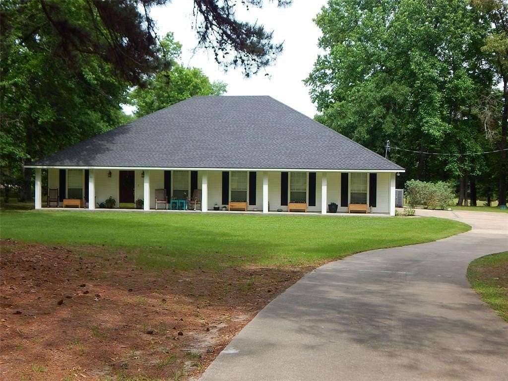 4.86 Acres of Land with Home for Sale in Gilmer, Texas