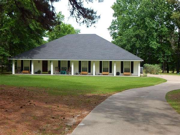 4.86 Acres of Land with Home for Sale in Gilmer, Texas