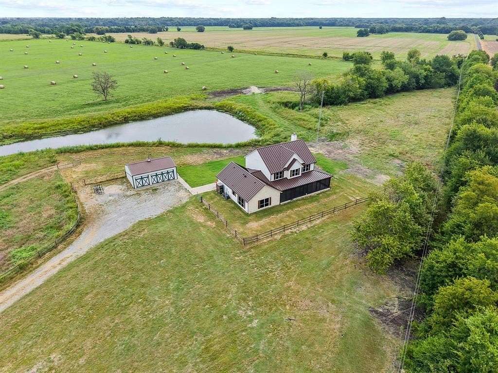 60 Acres of Land with Home for Sale in Wolfe City, Texas