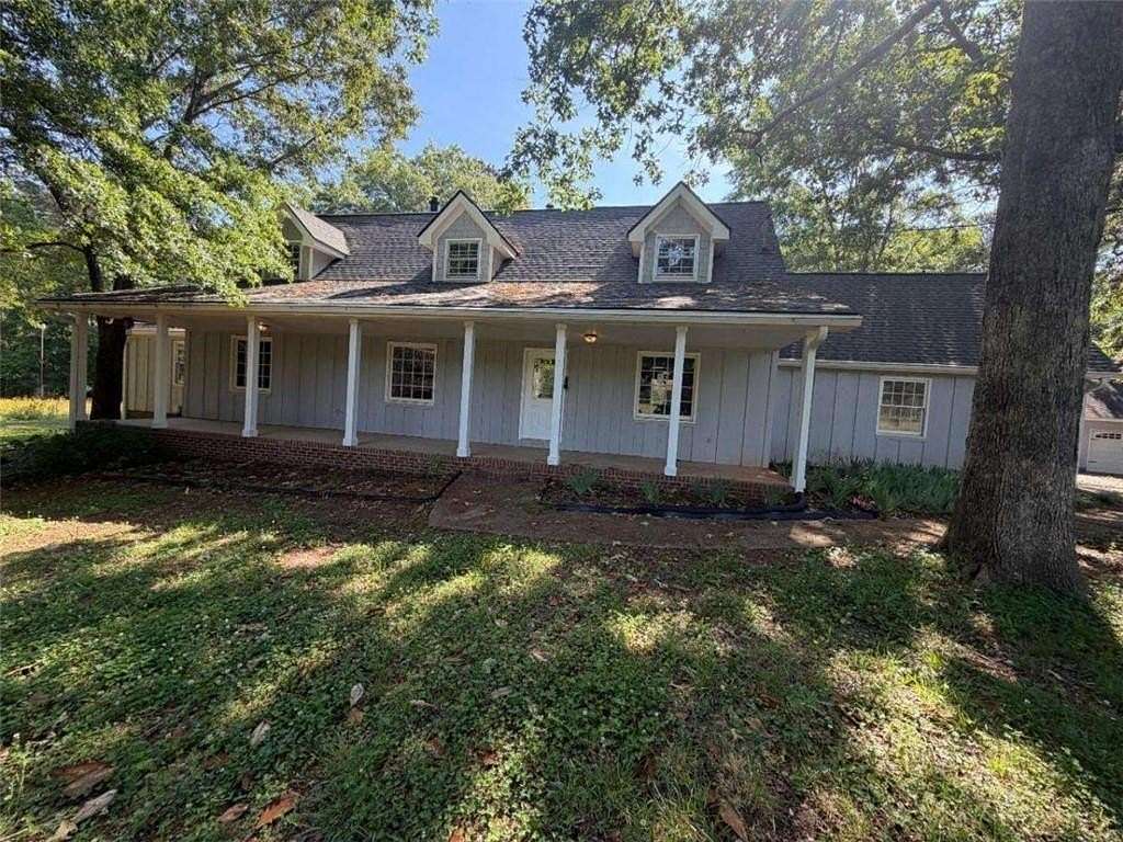 12.4 Acres of Land with Home for Sale in Locust Grove, Georgia