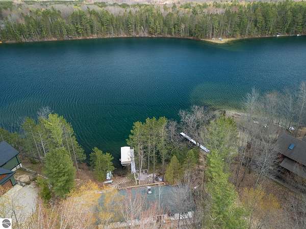 1.77 Acres of Land with Home for Sale in Mancelona, Michigan