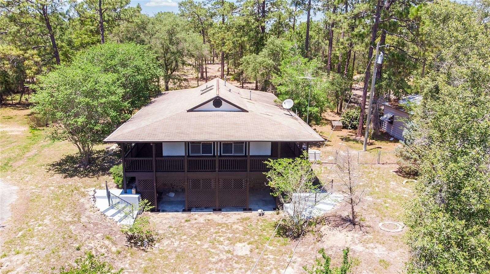 10.2 Acres of Land with Home for Sale in Morriston, Florida