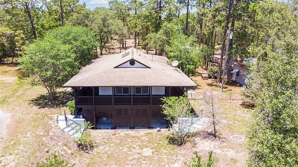 10.2 Acres of Land with Home for Sale in Morriston, Florida