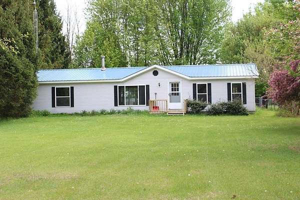 6.9 Acres of Land with Home for Sale in Harrison, Michigan