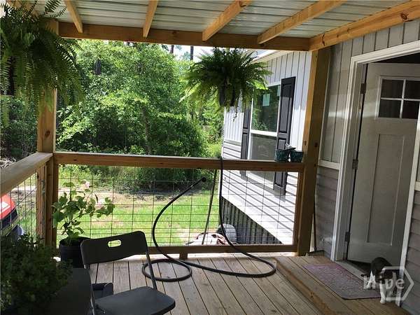 2.5 Acres of Land with Home for Sale in Fleming, Georgia