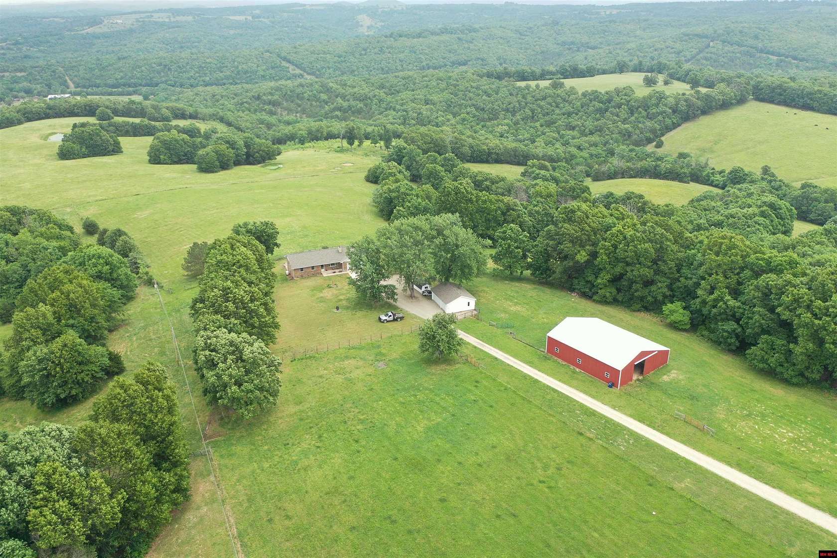 38.6 Acres of Agricultural Land with Home for Sale in Gainesville, Missouri