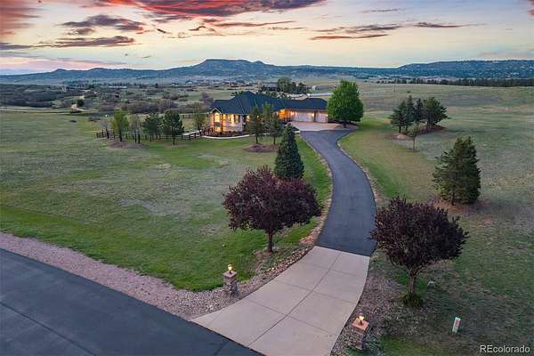 5 Acres of Land with Home for Sale in Sedalia, Colorado