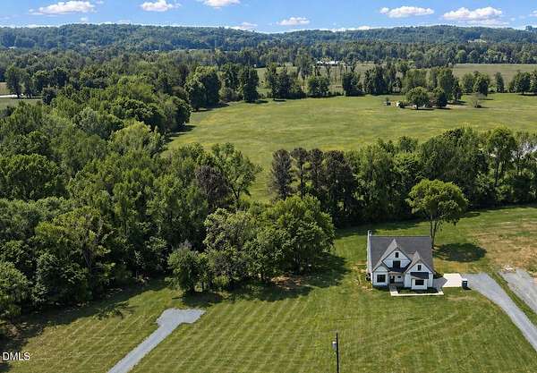 1.5 Acres of Land with Home for Sale in Siler City, North Carolina
