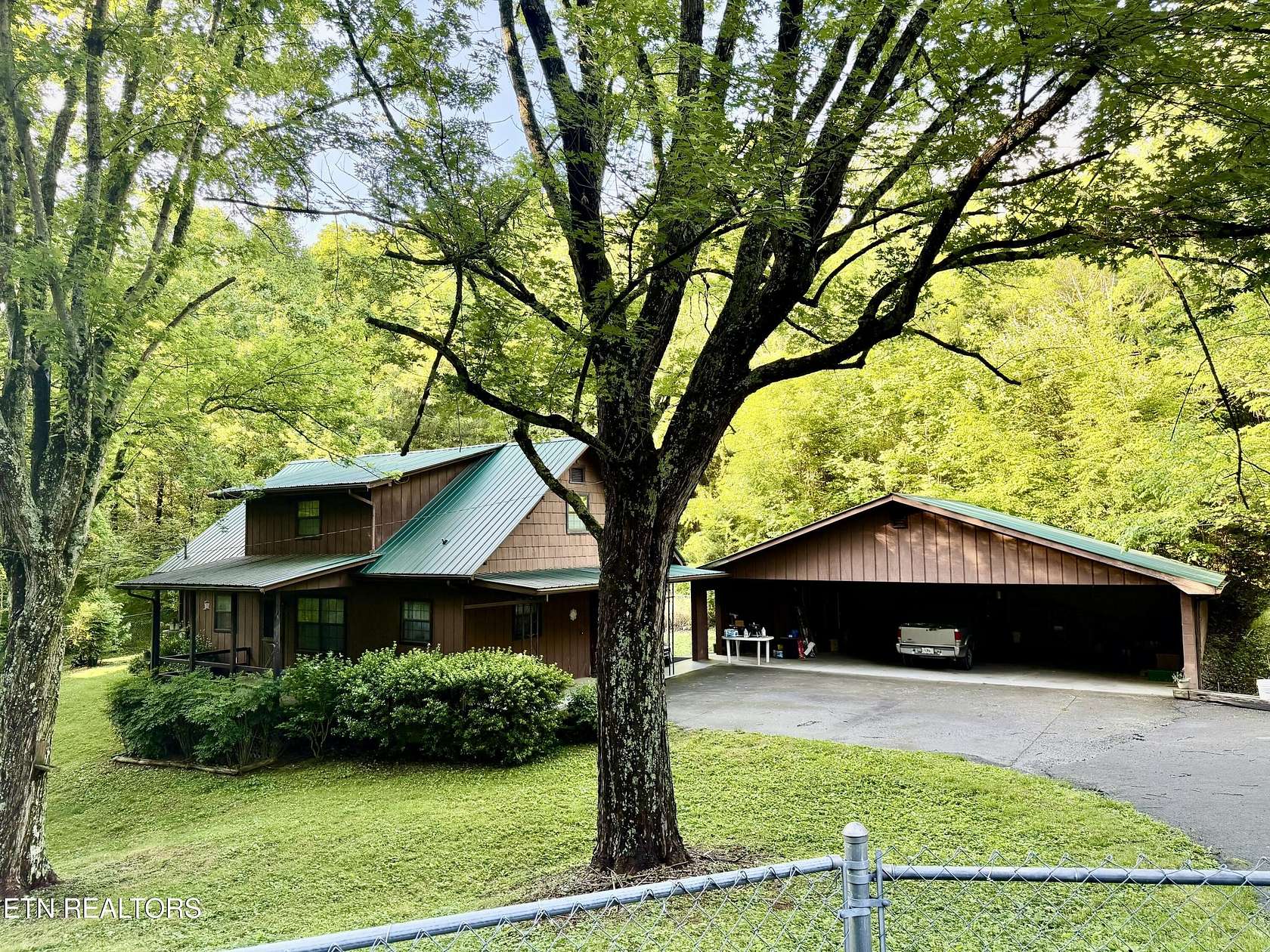 5.7 Acres of Land with Home for Sale in New Tazewell, Tennessee