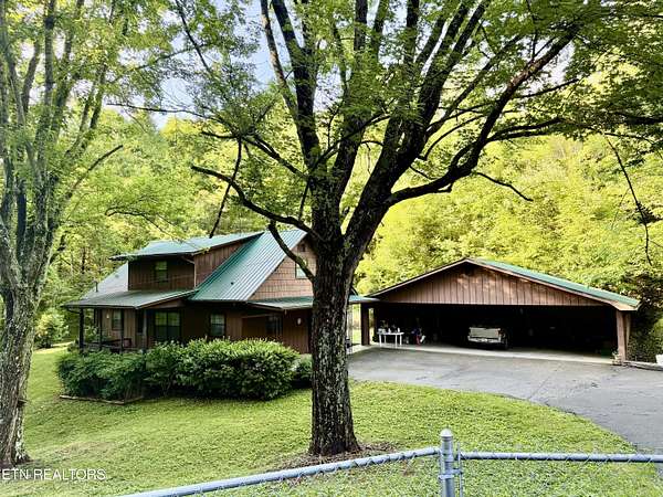 5.7 Acres of Land with Home for Sale in New Tazewell, Tennessee