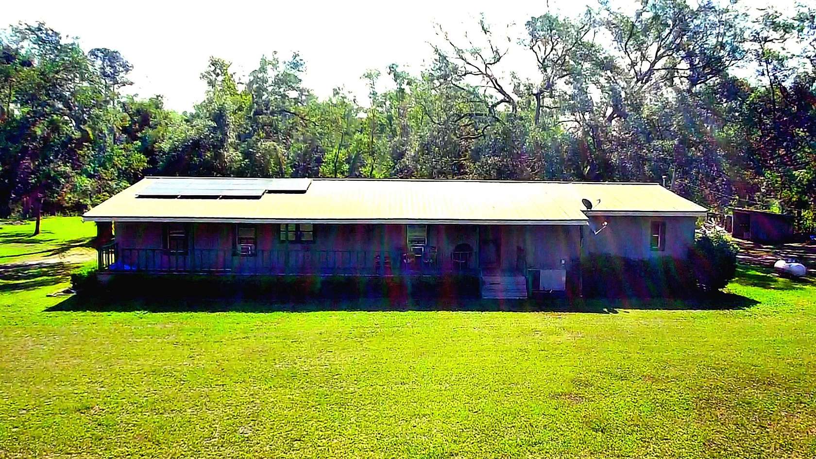 5 Acres of Land with Home for Sale in Perry, Florida