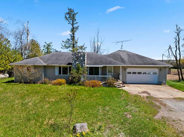 10.2 Acres of Recreational Land with Home for Sale in Gaylord, Michigan