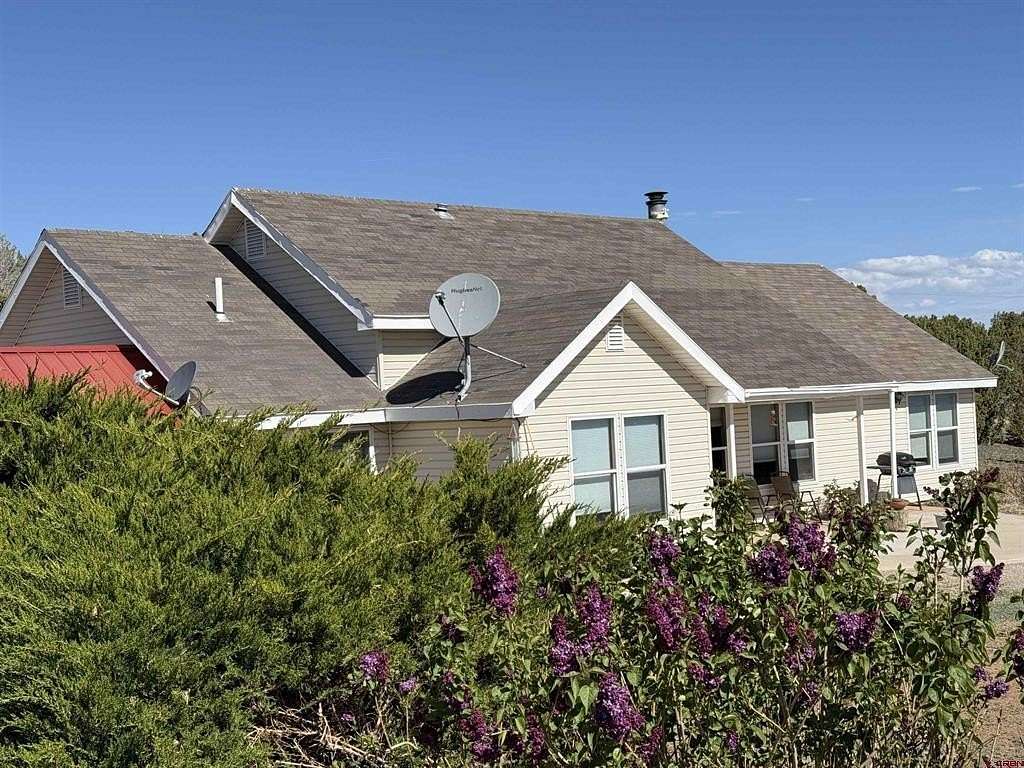 5.27 Acres of Land with Home for Sale in Crawford, Colorado