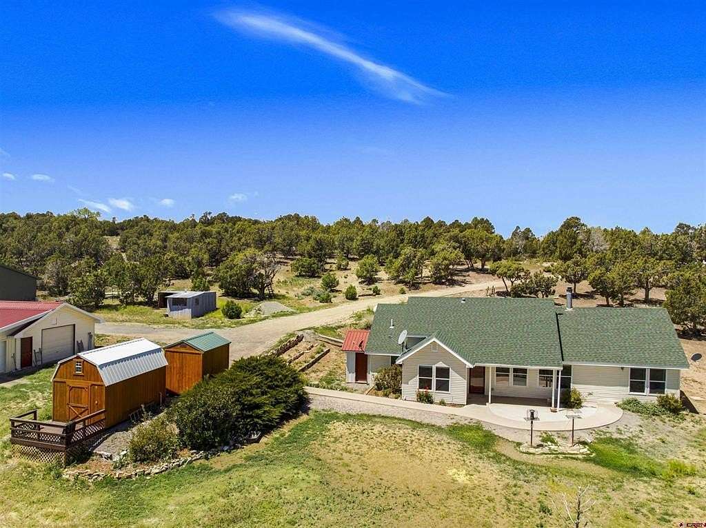 5.27 Acres of Land with Home for Sale in Crawford, Colorado