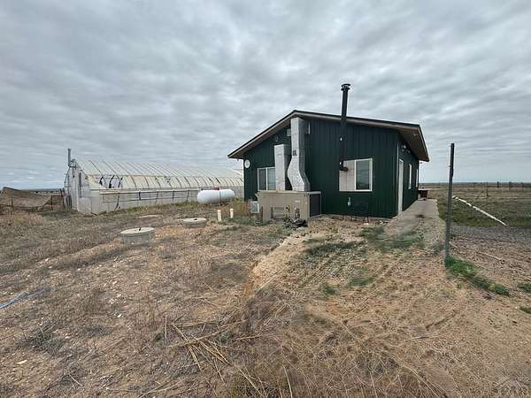 40 Acres of Agricultural Land with Home for Sale in Boone, Colorado