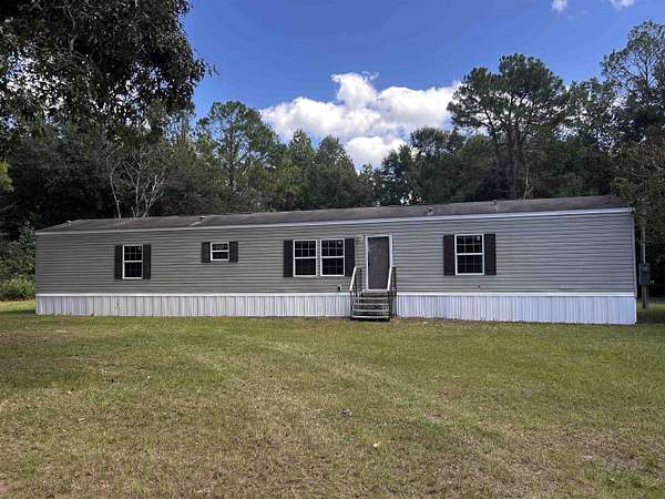 1.62 Acres of Land with Home for Sale in Crawfordville, Florida