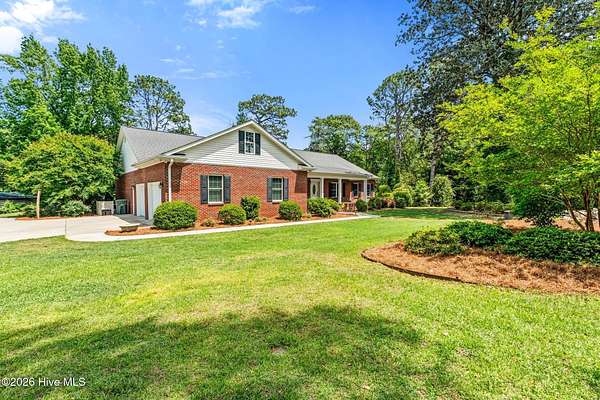 6.84 Acres of Land with Home for Sale in Hamlet, North Carolina