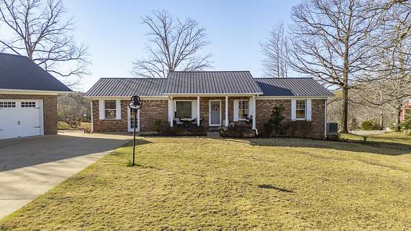 31 Acres of Land with Home for Sale in Savannah, Tennessee