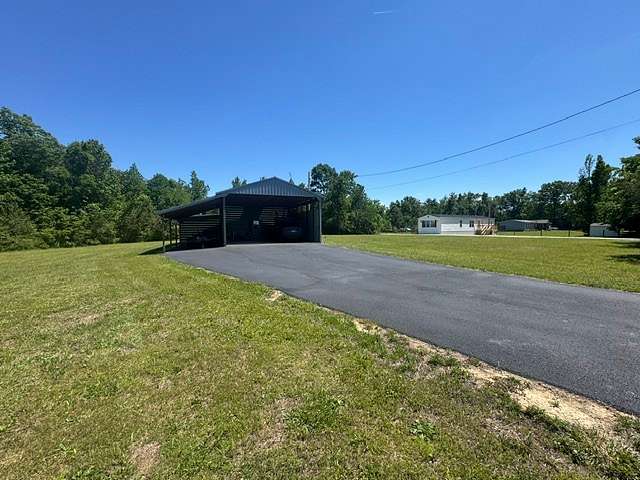 2.77 Acres of Land with Home for Sale in Linden, Tennessee