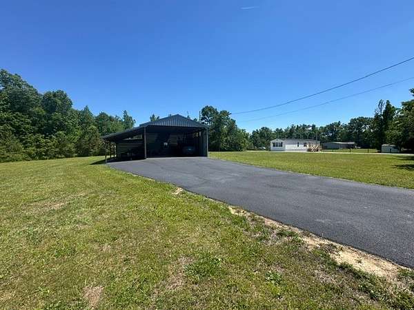 2.77 Acres of Land with Home for Sale in Linden, Tennessee