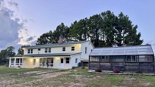 20 Acres of Land with Home for Sale in Hartville, Missouri