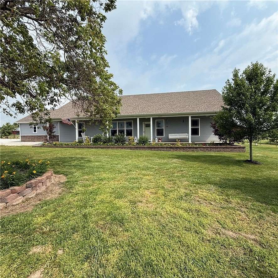 10 Acres of Land with Home for Sale in Gentry, Arkansas