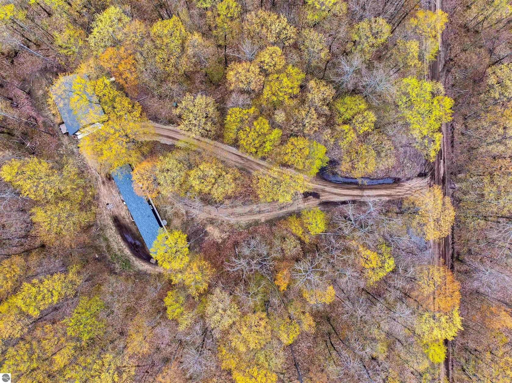 10 Acres of Land with Home for Sale in Mancelona, Michigan