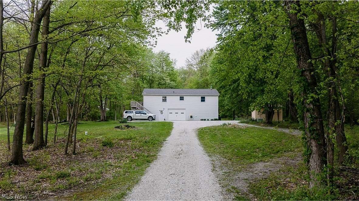 22.5 Acres of Recreational Land with Home for Auction in North Lawrence, Ohio
