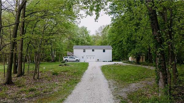 22.5 Acres of Recreational Land with Home for Auction in North Lawrence, Ohio
