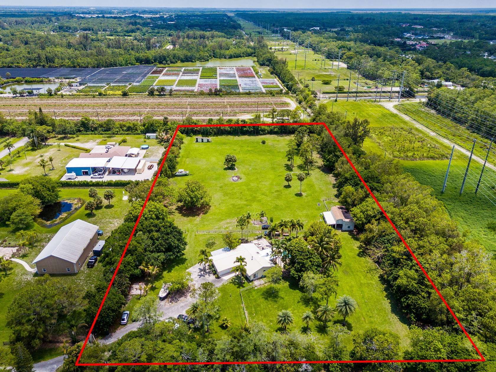4.66 Acres of Land with Home for Sale in Lake Worth Beach, Florida