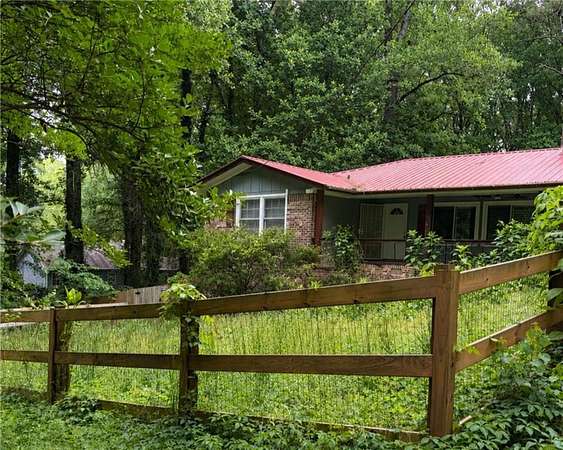 4.43 Acres of Land with Home for Sale in Lilburn, Georgia