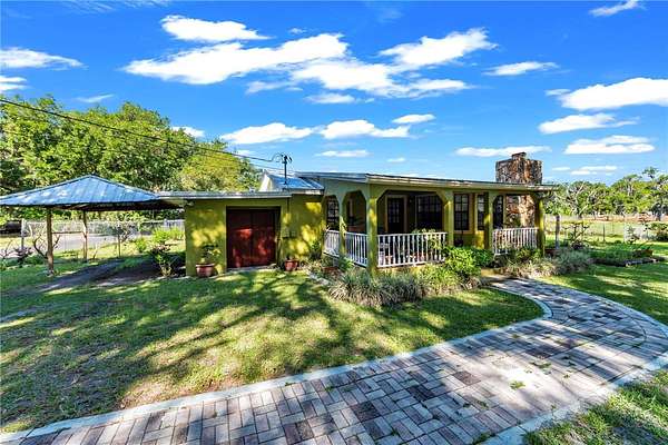 1.85 Acres of Land with Home for Sale in Dover, Florida
