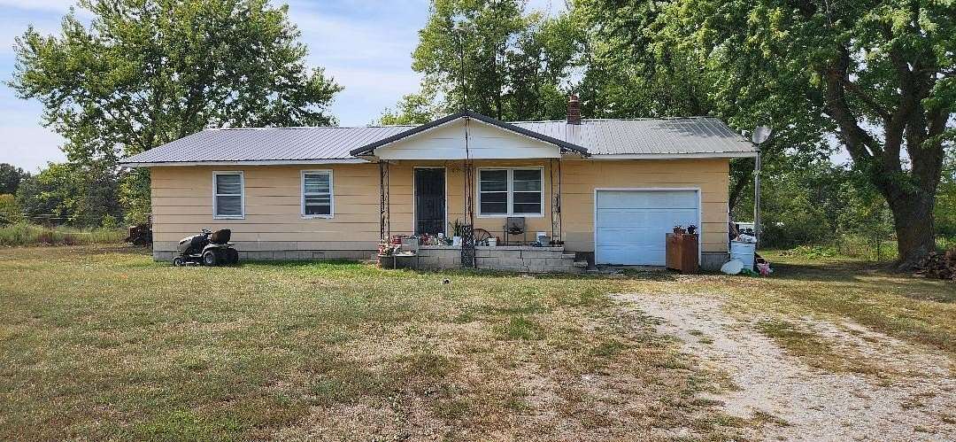 48.9 Acres of Land with Home for Sale in Long Lane, Missouri