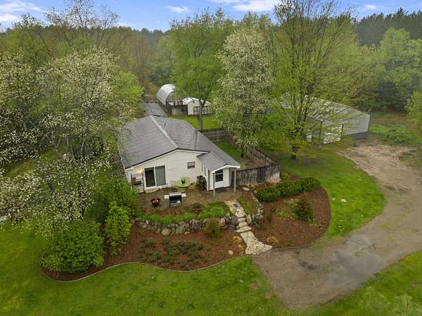 5 Acres of Land with Home for Sale in Bear Lake, Michigan