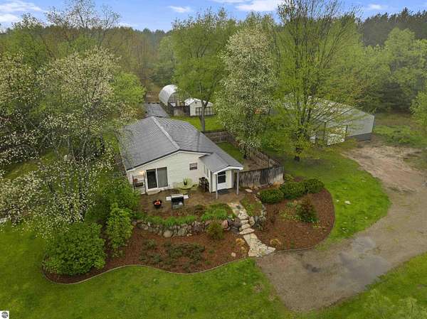 5 Acres of Land with Home for Sale in Bear Lake, Michigan