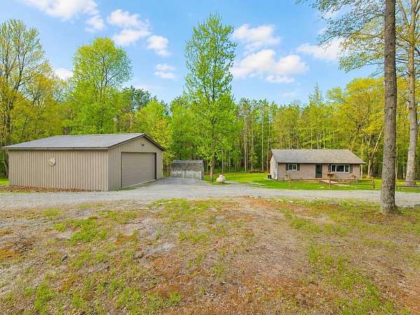 1.6 Acres of Land with Home for Sale in Farwell, Michigan
