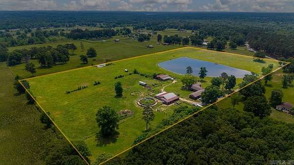 23.4 Acres of Land with Home for Sale in Benton, Arkansas