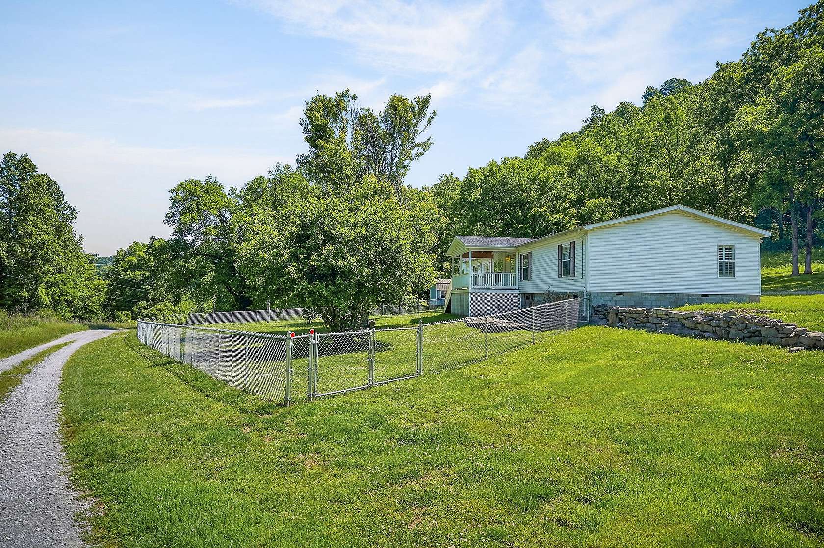 164 Acres of Land with Home for Auction in Buffalo Valley, Tennessee